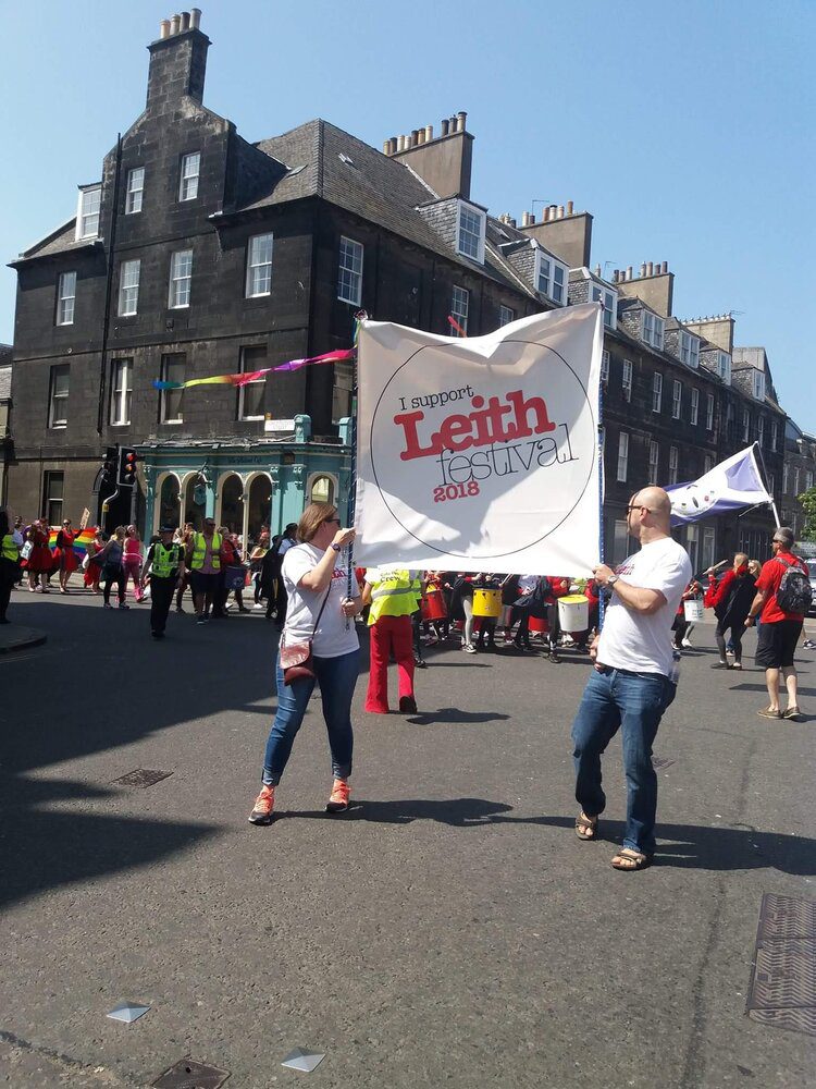 A vibrant street performance during The Leith Festival.